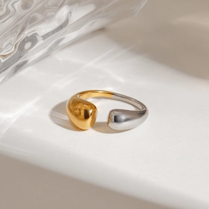 Minimalist gold and silver two-tone stainless steel open ring with water drop design