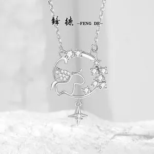 Macro shot of S925 sterling silver unicorn pendant with cubic zirconia on stone