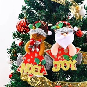 Close-up of Santa and Reindeer plush hanging ornaments for festive Christmas tree decor