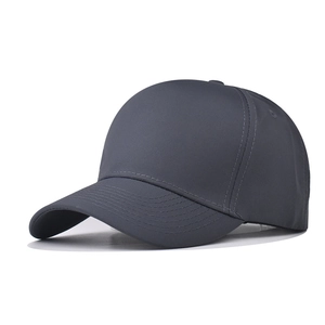 Detail of dark grey six-panel baseball cap showing durable twill cotton and stitched eyelets