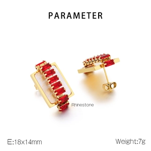 Detail of gold titanium earrings with red rectangular rhinestones measuring 18x14mm