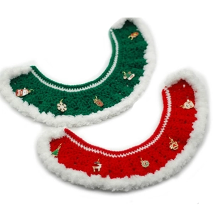 Handmade crochet Christmas pet cape set with red and green knit scarves and festive charms