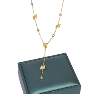 Elegant gold butterfly tassel necklace with sparkling rhinestones in titanium steel
