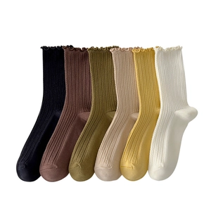 Pack of 6 pairs of women's frilly edge socks in black, brown, green, beige, yellow, and white