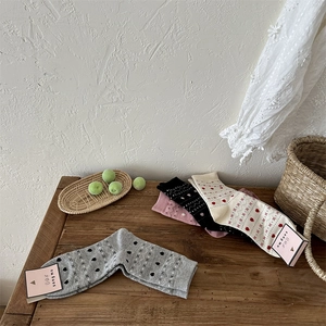 Détails de chaussettes en tricot vintage style Noël avec motifs de cœur et jacquard