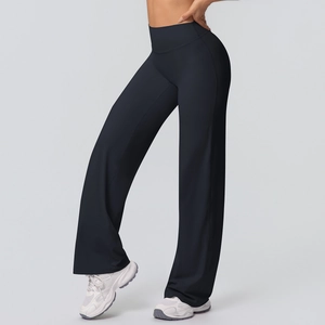Detail view of high-waisted black yoga pants with a wide-leg straight cut for fitness