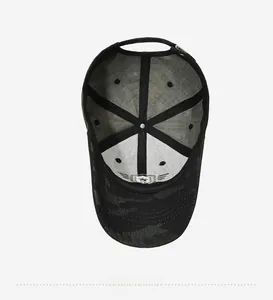 Detail of camouflage baseball cap interior with reinforced black tape and metal buckle