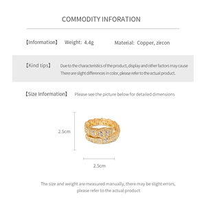 Detailed view of gold snake ring with micro-pave cubic zirconia on copper band