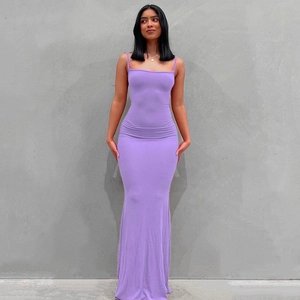 Close-up of lilac purple slim-fit maxi dress featuring delicate spaghetti straps and soft fabric
