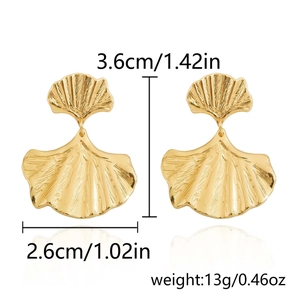 Detailed view of gold ginkgo leaf earrings with 3.6cm by 2.6cm size and 13g weight info