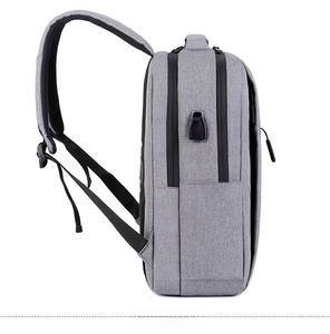 Detail view of business backpack with USB charging port and breathable shoulder straps