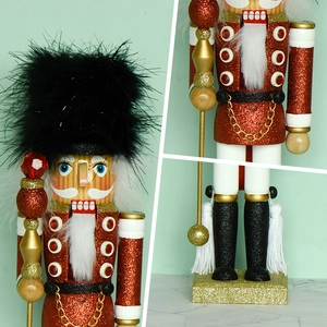 Classic 35cm Nutcracker King with red glitter body, gold accents and feather hat