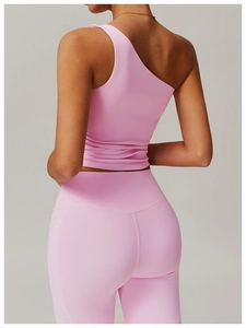 Detailed back view of pink one-shoulder yoga vest and high-waist leggings with side pockets