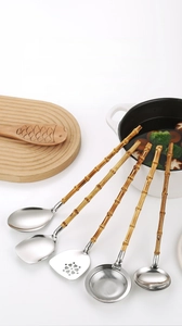 Detail showing natural bamboo handle and 304 stainless steel texture of Japanese utensils