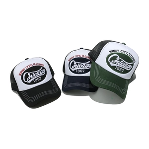 Three retro Chicago 1967 mesh trucker hats in black, navy blue, and forest green