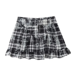 Mini-jupe à carreaux noirs et blancs pour femme avec ourlet à volants et boutons