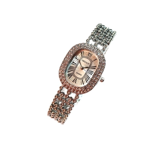 Montre à quartz ovale pour femme avec cristaux brillants et chiffres romains de luxe