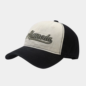 Detailed close-up of Alameda embroidery on two-tone cotton baseball cap with stitch detail