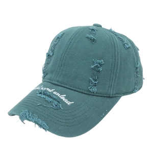 Close-up of vintage washed baseball cap with distressed details and brim embroidery