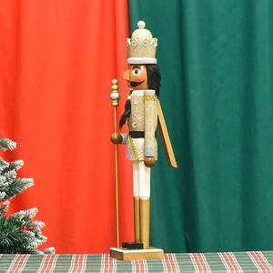 60cm wooden King Nutcracker soldier in gold and white with royal scepter on red background