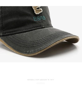 Detailed view of ESRB 3D embroidery on dark gray vintage cotton twill baseball cap