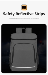 Macro detail of high-visibility reflective strip on grey insulated outdoor backpack