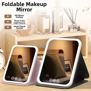 Detail of portable LED makeup mirror with leather folding case and touch sensor button