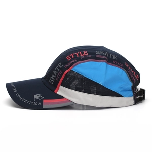 Close-up of quick-dry baseball cap featuring side mesh panels and skate style graphics