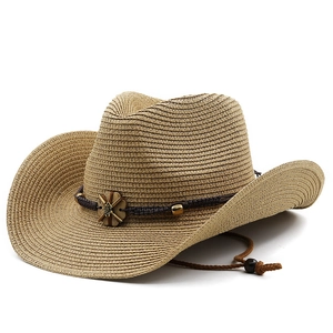Classic western straw cowboy hat with wide brim, ethnic decorative band and chin strap