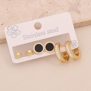 Set of three stainless steel earrings including gold studs, black hoops, and zircon hoops