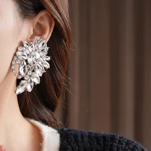 Sparkling crystal flower earrings for women featuring oversized floral design and silver finish