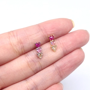 Triple heart stainless steel studs in pink gradient on silver and gold metal bases