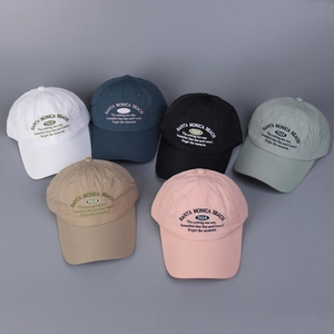 Detailed embroidery of Santa Monica Beach 1924 on various colors of baseball caps