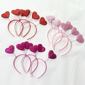 Glittering red and pink heart headbands with bouncy springs for Valentine party