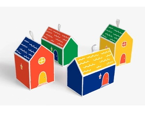 Flat lay view of colorful house-shaped gift boxes in red, blue, green, and yellow colors