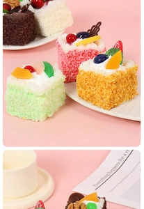 Macro shot of assorted colorful mousse cake models with realistic fruit toppings