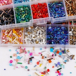 DIY glass seed bead kit in transparent organizers with colorful beads for embroidery crafts