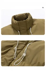 Detailed close-up of windproof stand collar with adjustable drawstring on khaki outdoor jacket