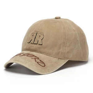 Close-up of khaki washed baseball cap featuring RR patch and sports embroidery detail