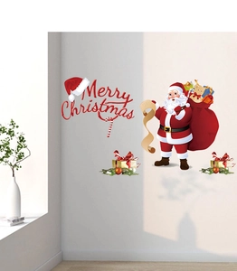 Detail view of Merry Christmas wall stickers with Santa and gift boxes in a living room