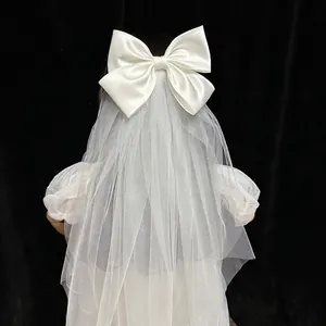 White bridal bow veil with double-layer mesh for weddings and photo shoots