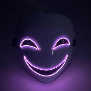 Front view of LED glowing clown mask with purple lighting on black background