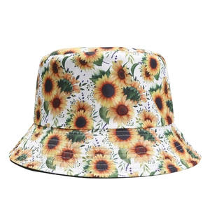 Outdoor white bucket hat with yellow sunflower pattern for sun protection and shade