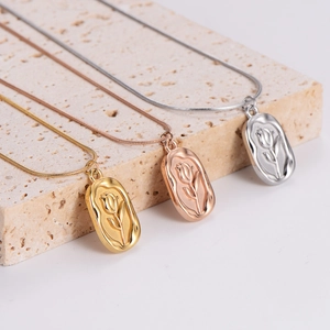 Vintage irregular tulip flower relief pendant necklaces in gold, silver and rose gold finishes