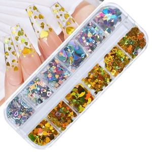 Detailed view of 12-grid heart nail sequins set with laser glitter effects in a clear box