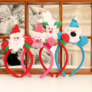 LED Christmas headbands featuring Santa, Snowman, and Reindeer on a cozy wooden shelf