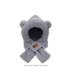 Detail of plush grey teddy bear hood with scarf and soft faux rabbit fur texture