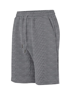 Close-up of dark grey men's casual shorts with textured jacquard knit and drawstring waist