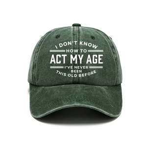Retro dark green washed cotton baseball cap with white slogan on a clean white background