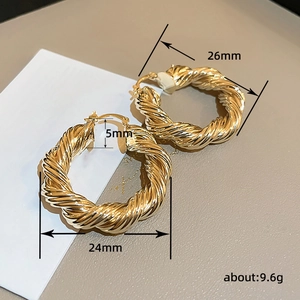 Vintage gold hollow waterdrop earrings with twisted texture, 26mm diameter hoop for women